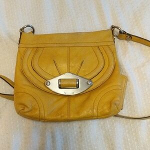 B. Makowsky Mustard Leather Crossbody with Silver Turnlock